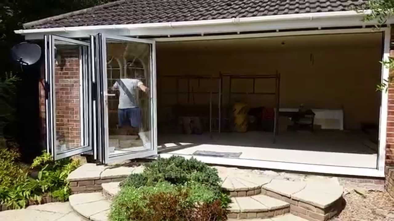 Schüco - Schueco - 5 pane Aluminium bifold door, all folding to one side.