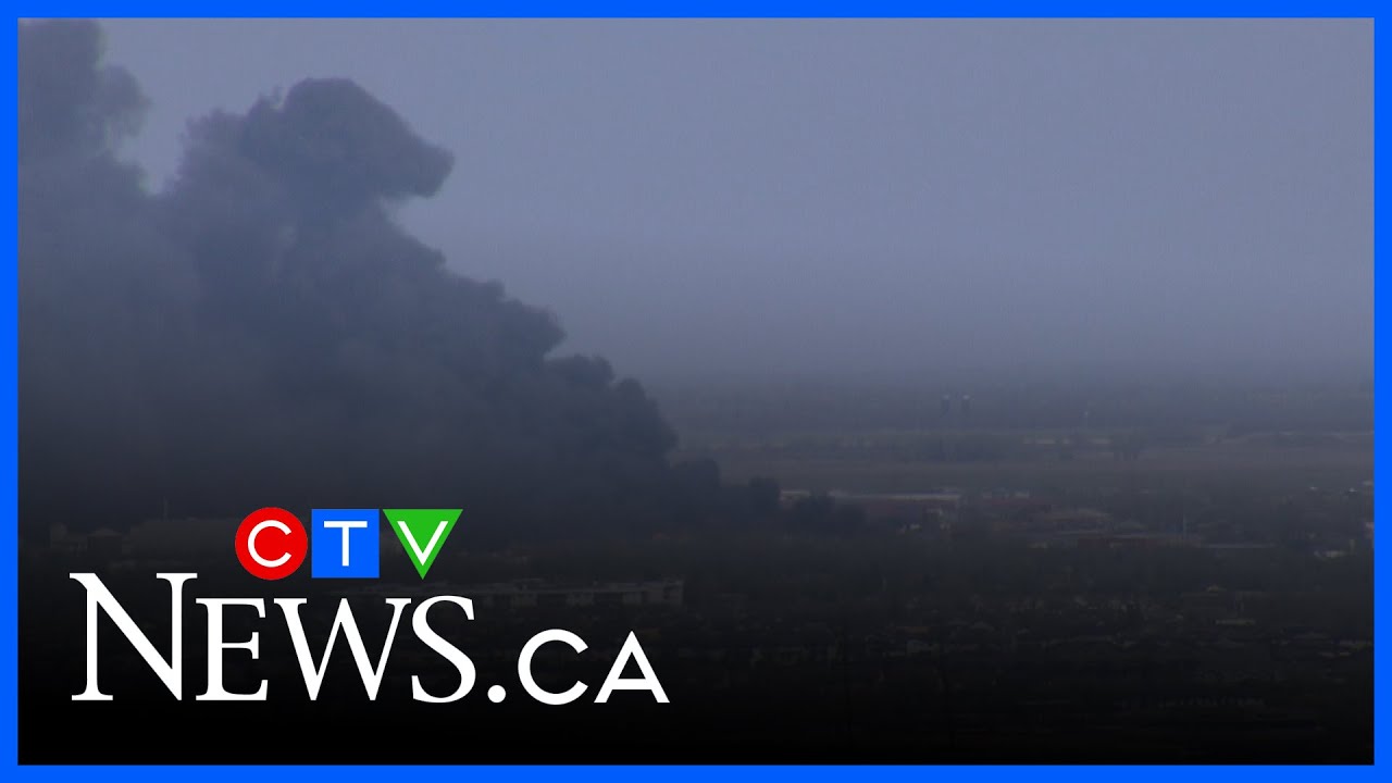 Large grass fire sends smoke billowing over Winnipeg