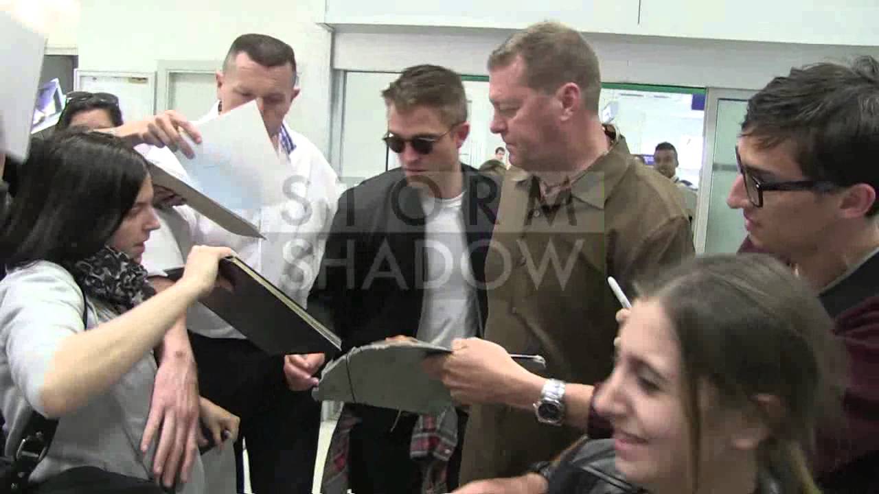 EXCLUSIVE: Robert Pattinson arriving in Cannes airport for the 2014 festival
