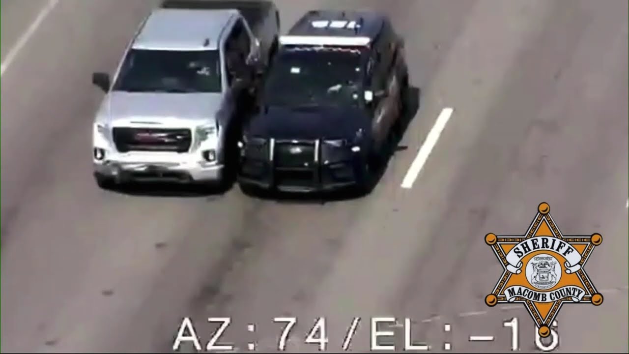 Michigan sheriff's deputy climbs into vehicle with dazed man who was driving erratically