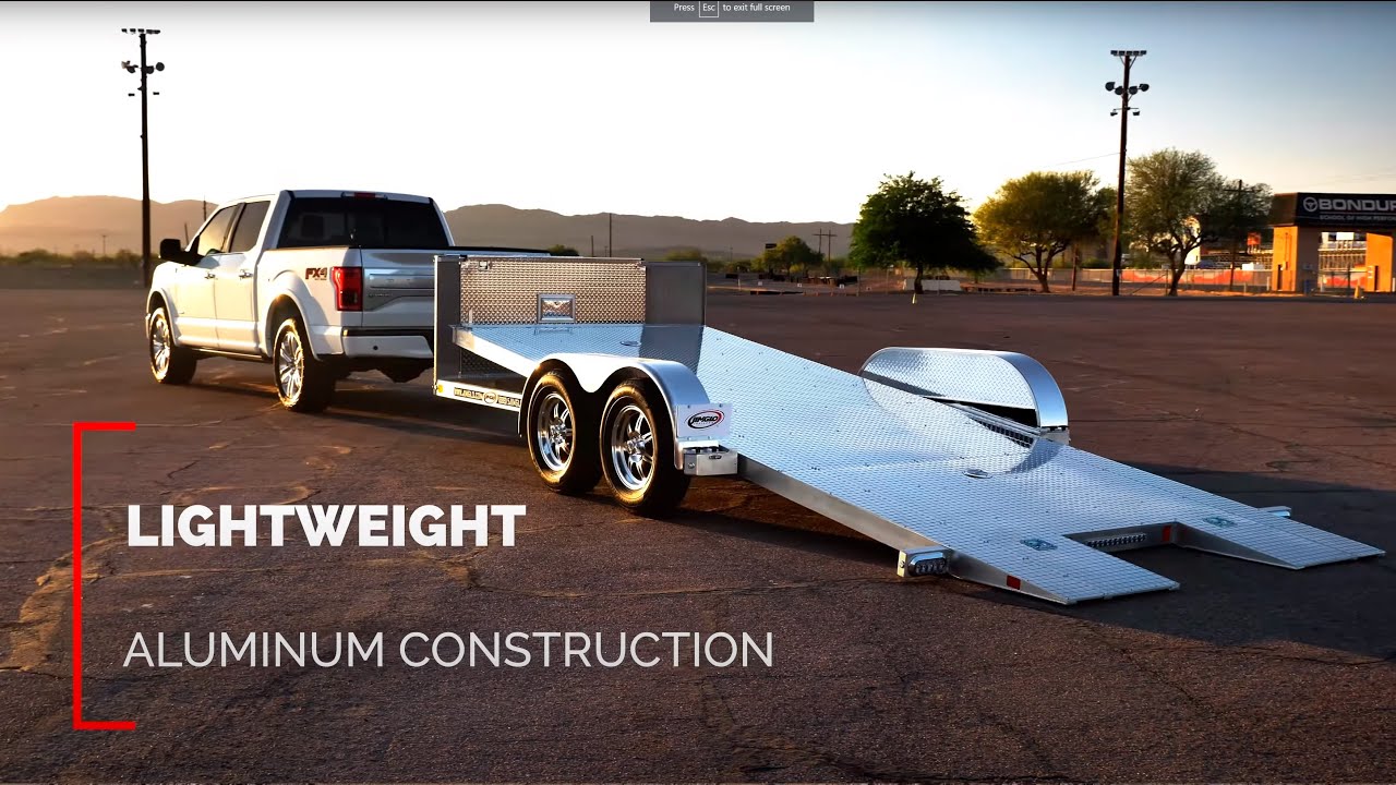Open Car Trailer that is simple to load, even with the lowest of cars.  Check out the JIMGLO Ego.