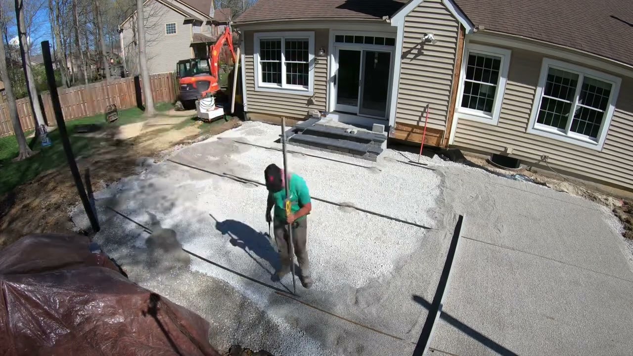 Installing a paver patio.