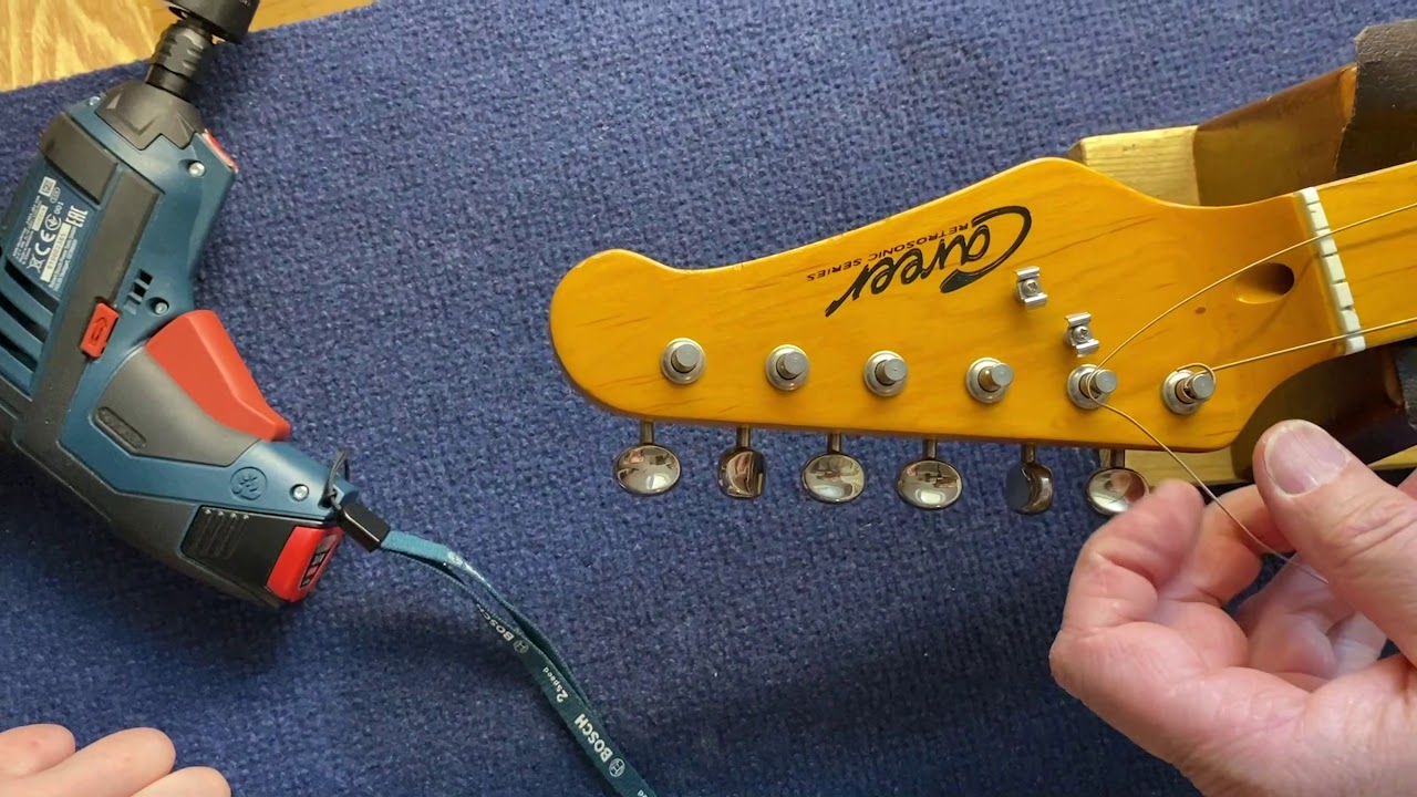 SAITEN AUFZIEHEN BEI GITARREN MIT TREMOLO