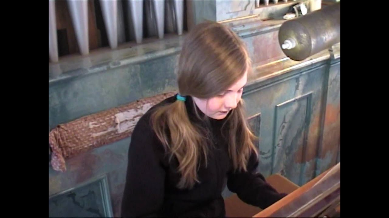 10 years old girl plays a real church organ in Bavaria