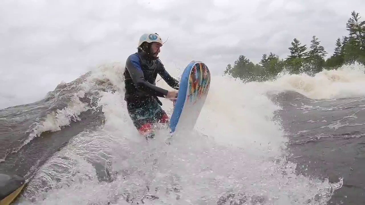 Tom Paterson freestyle riverboarding on Mini bus