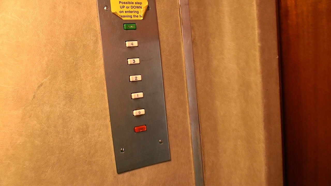 Two Old Lifts / Elevators - One with no car door