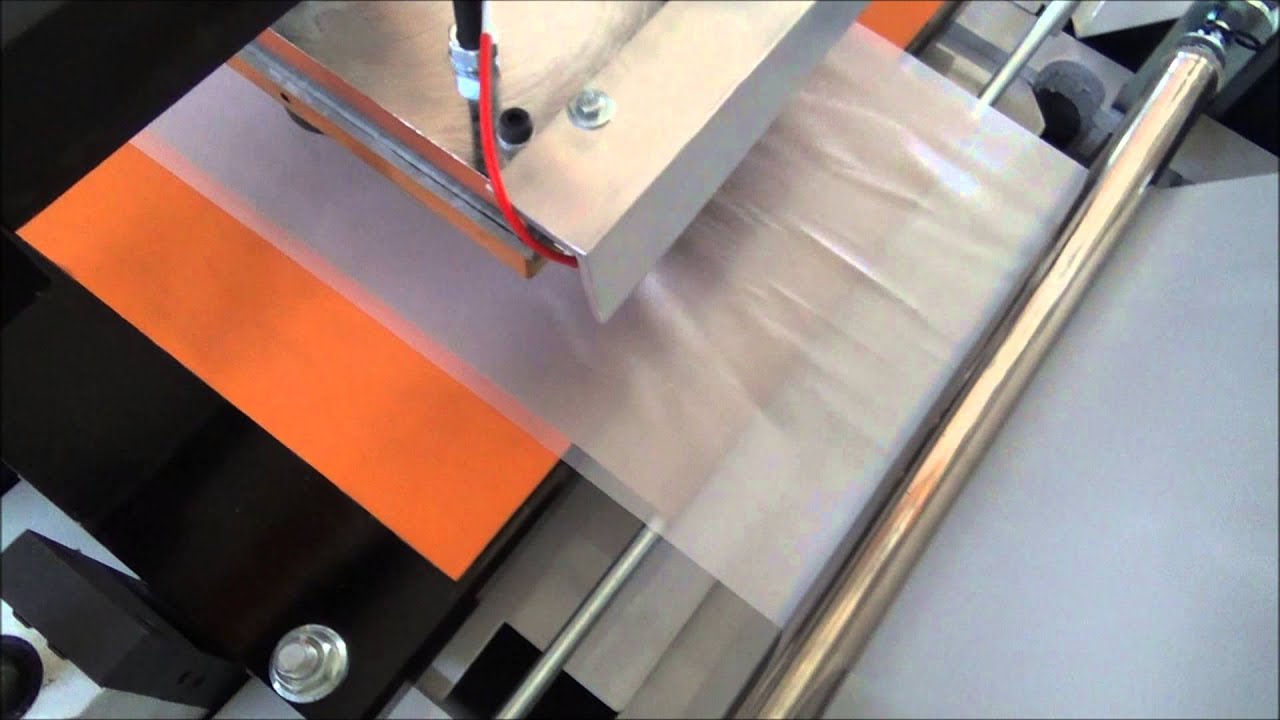 Plastic Glove Making Machine