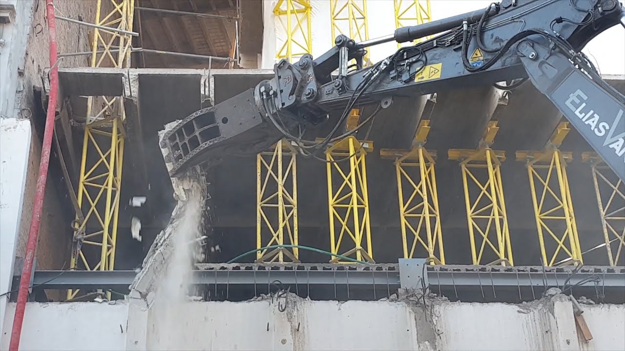 Concrete pulverizer or crusher in action