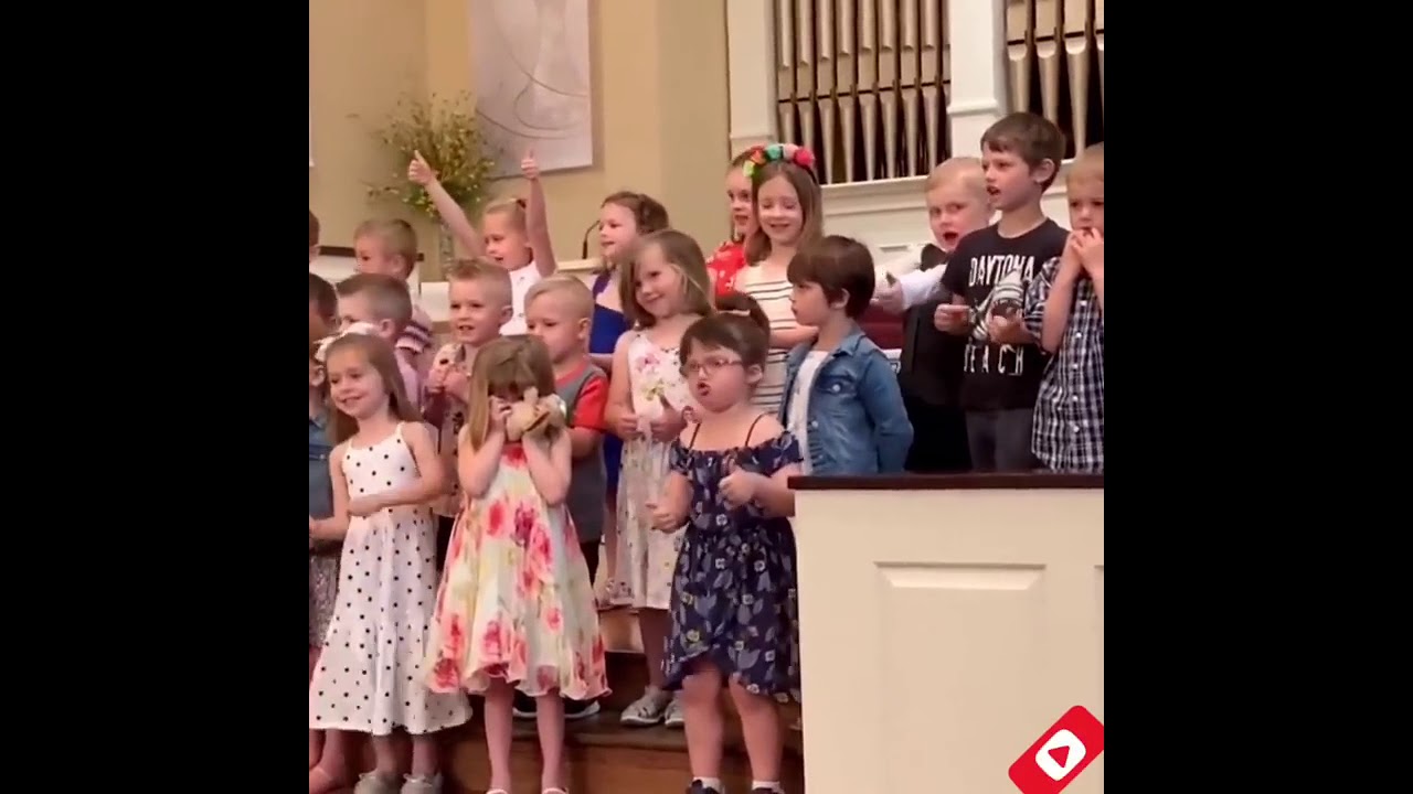 Little girl breaks out the dance Moves during a concert in their School