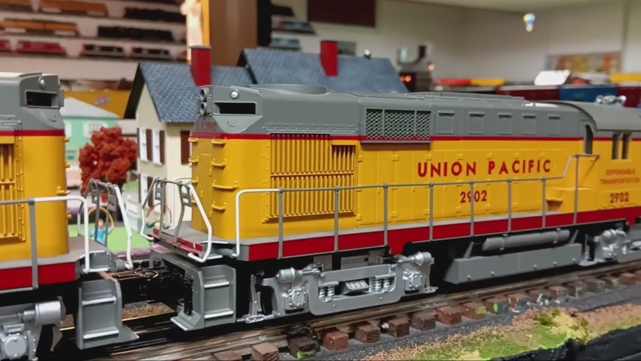 RS11 and RSD12 by Weaver Models, hauling coal