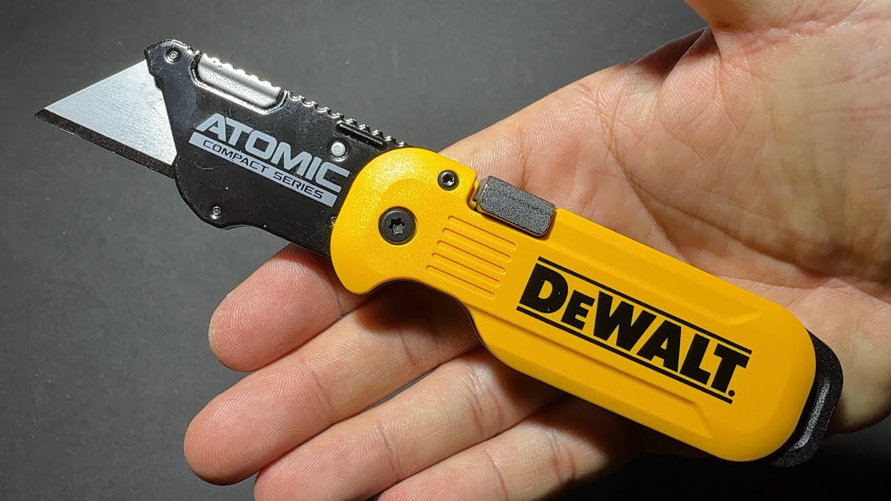 DEWALT ATOMIC UTILITY KNIFE DWHT10990 (Borrowed) - Compact, foldable, and fits comfortably in the...