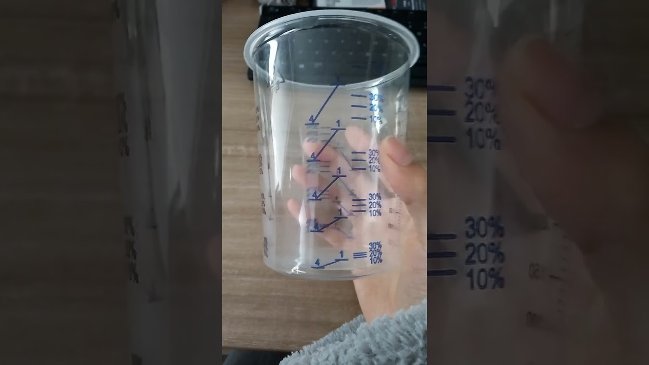 paint measuring cup, accurate calibration on the transparent cup