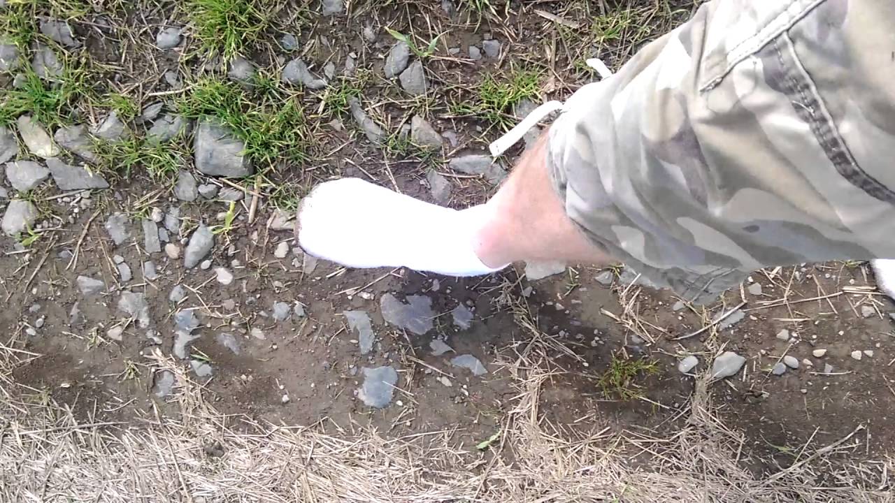 New white socks, muddy field