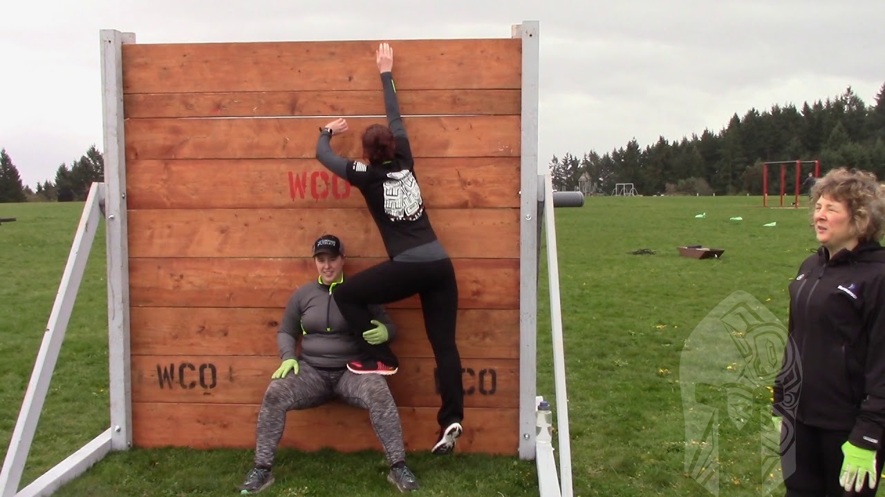 How to assist over the 8' wall climb.
