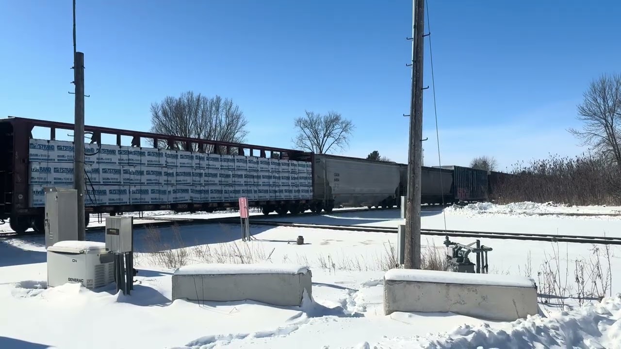 CN8906 SD70M-2 leads a freight train. Trailing Units CN5644 SD75I, CN8841 SD70M-2 & CN3320 AC44C6M.