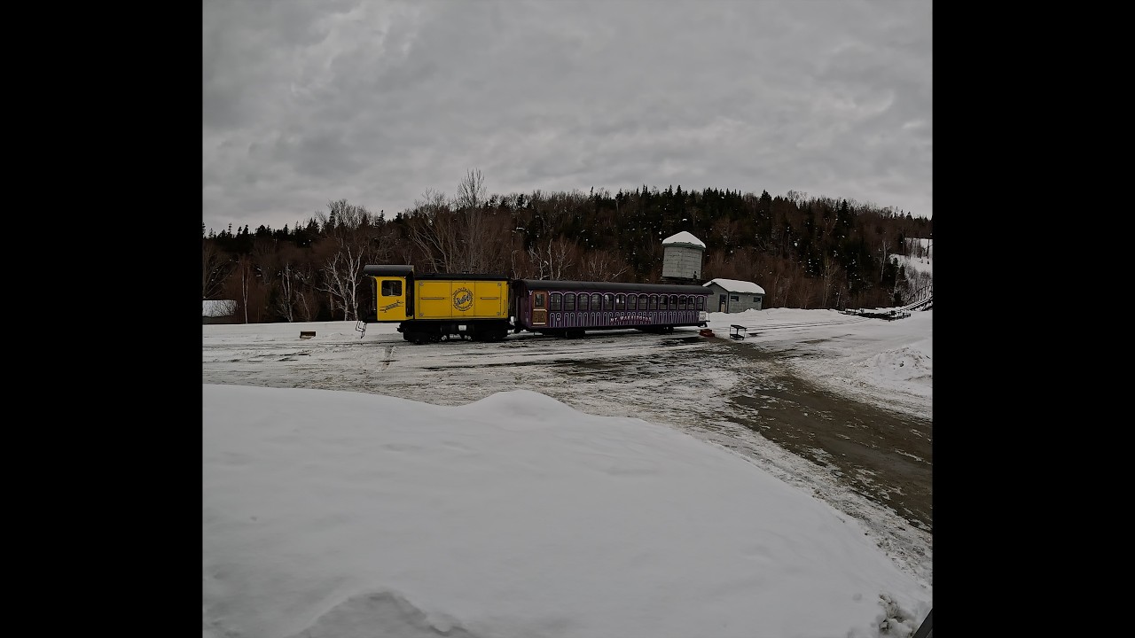 Grampy rides the Mount Washington Cog rail way in the winter.