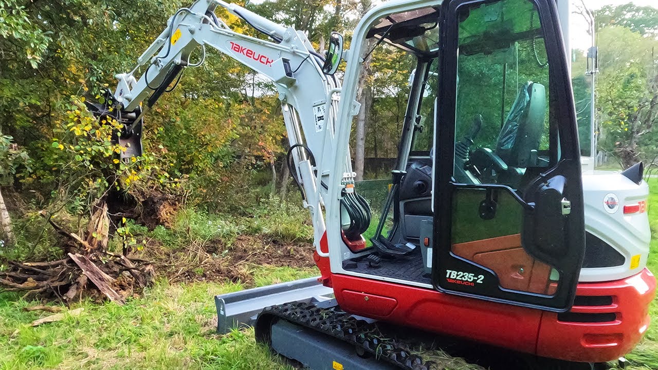 Digging Out Stumps with the NEW Takeuchi Mini Excavator