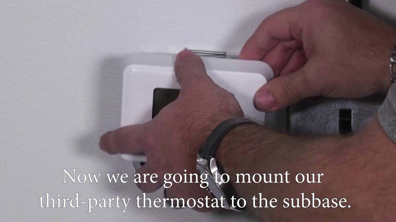 Installing a thermostat adaptor to an indoor unit