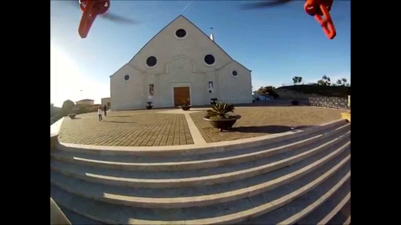 Exacopter Naza flying over the churches.wmv