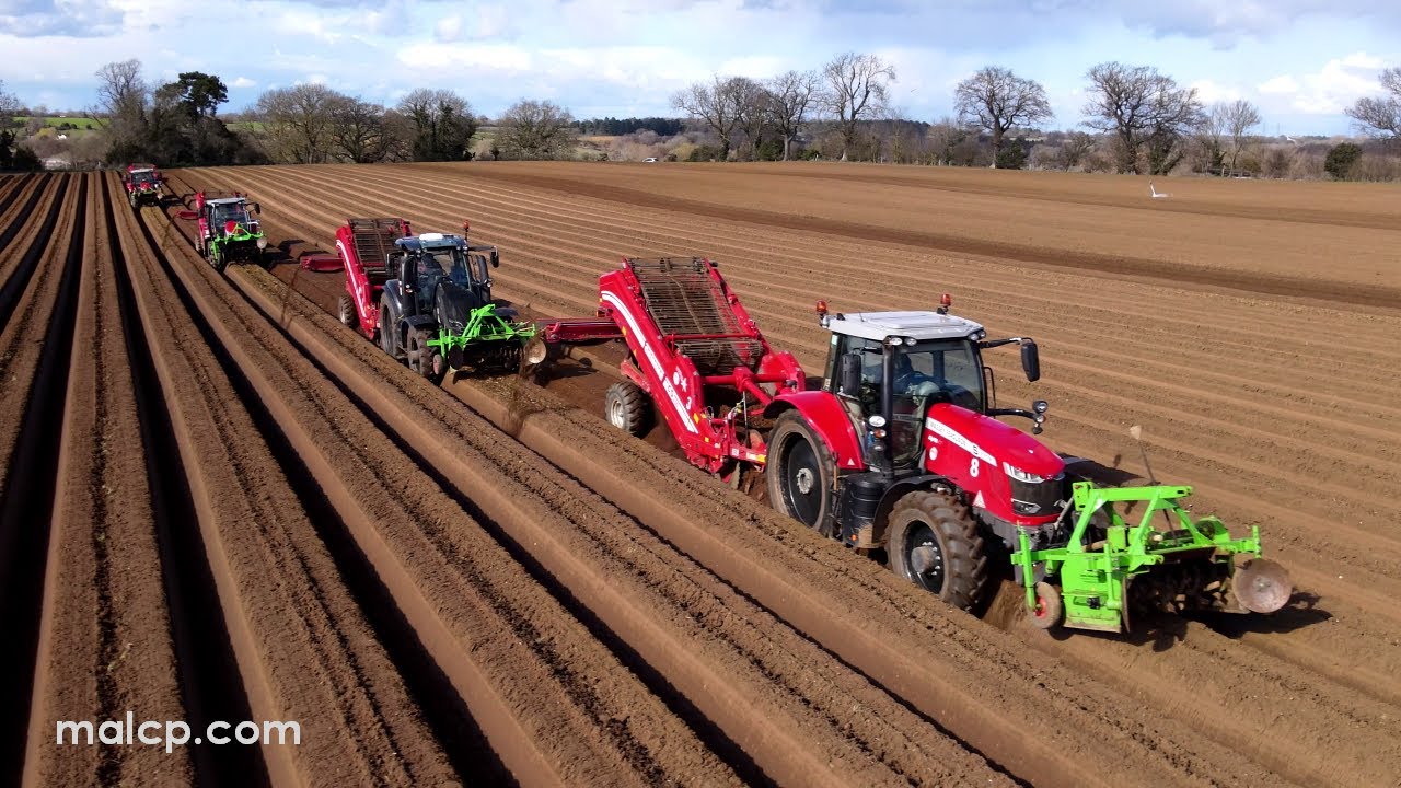 4k Foskett Farms planting potatoes in Eyke - Part 1. Ten tractors in one field on a very windy day!