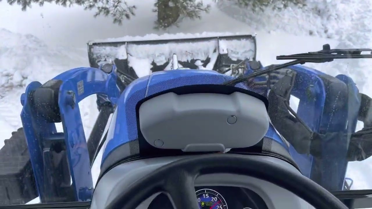 Boomer 40 plowing snow