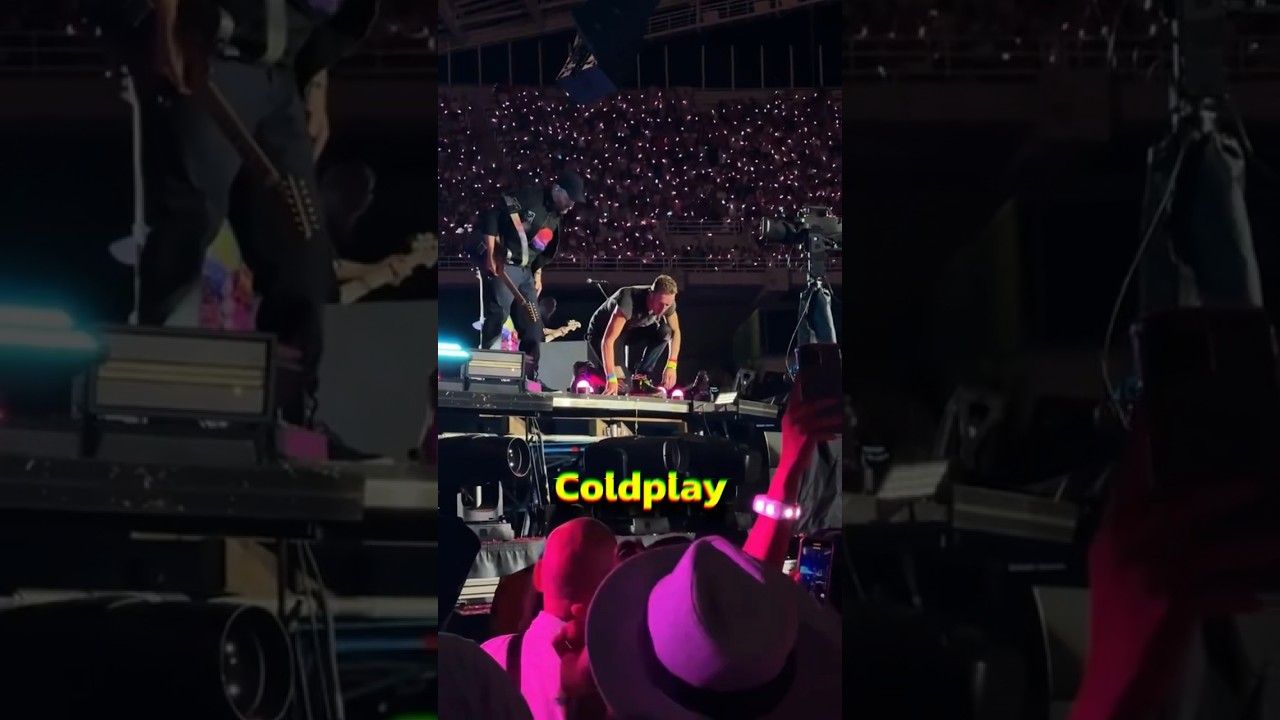 Coldplay fan FALLS off stage during the show!
