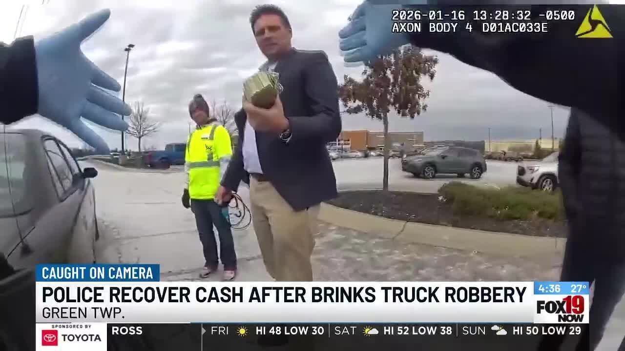 Body camera footage released of police recovering cash from $221K robbery