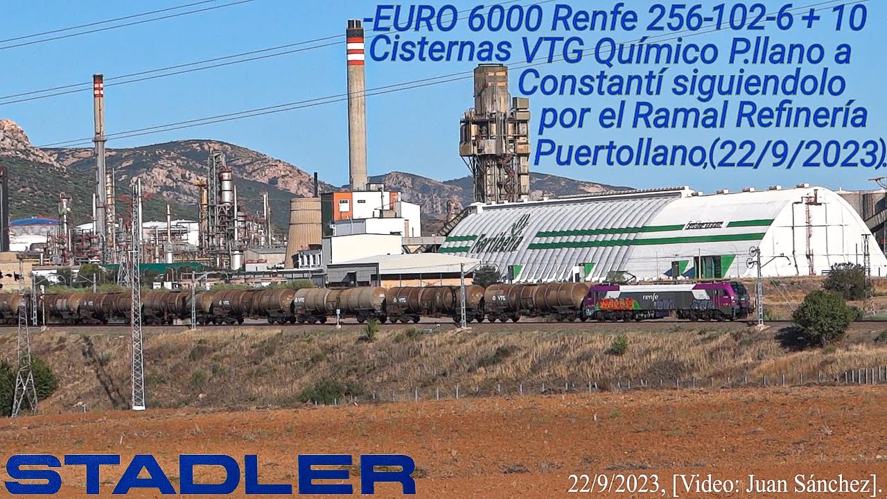Renfe 256-102 +10 cisternas VTG químico Puertollano Refinería-Constantí siguiendolo Ramal Refinería.