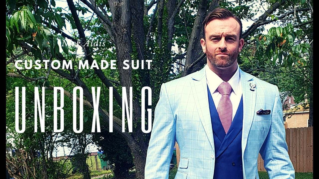 Unboxing my new Custom-made suit from The Nick Aldis Collection by Nasir Suits with my 5yr old son.