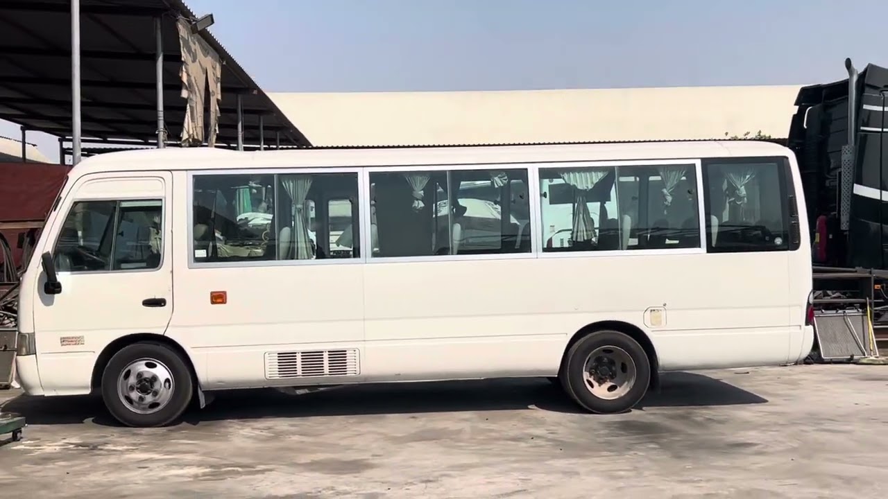 Toyota Coaster 30 Seater Bus Rental in Dubai | Small Bus For Rent | Minibus Hire in UAE