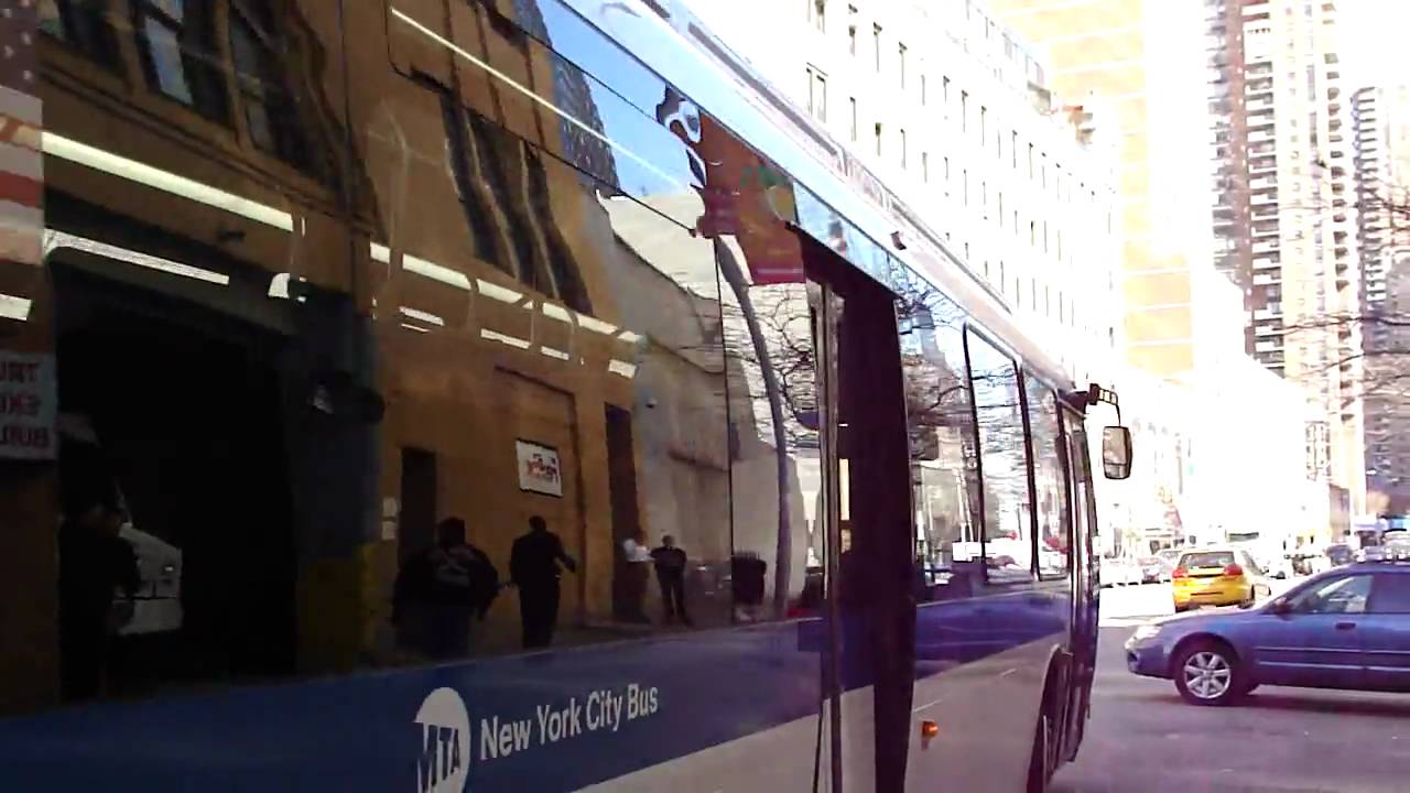 MTA New York City Bus 2009 Designline Eco-Saver IV Hybrid 1302 On The M42 @ 42nd St & 11th Ave