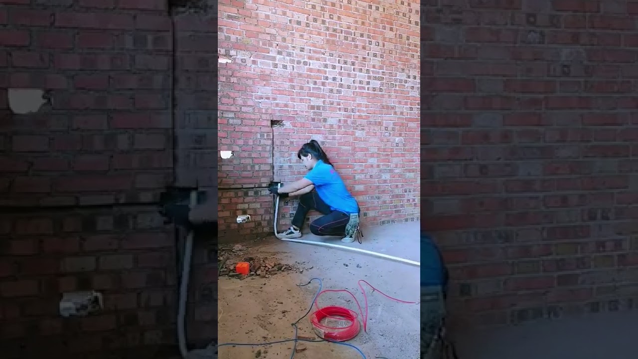Indoor brick house wire pipe embedded- Good tools and machinery make work easy