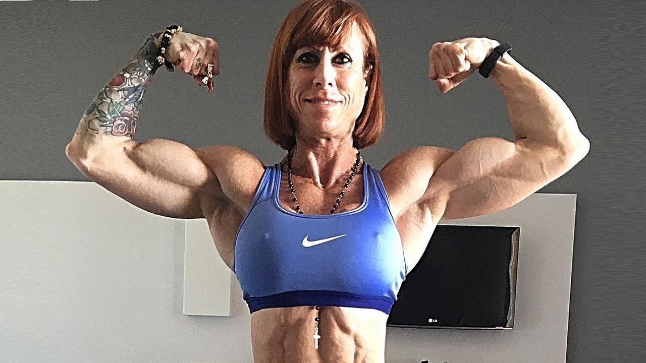 45 years young bodybuilder Barbara Carità - Hard muscles flexing