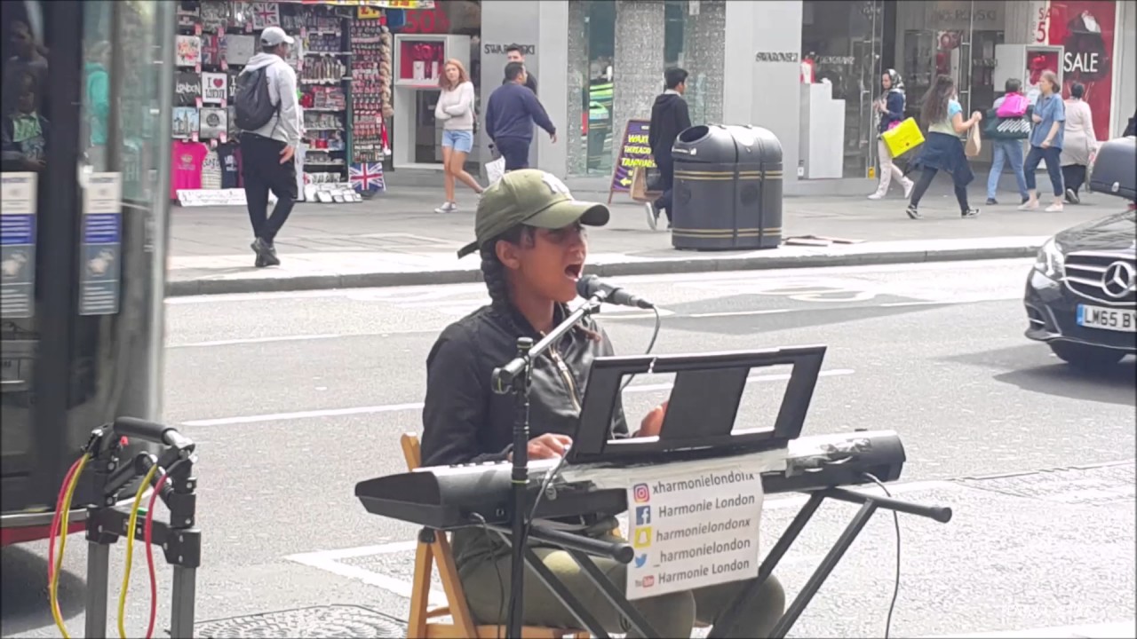 Harmonie London, a13-year-old busker, 