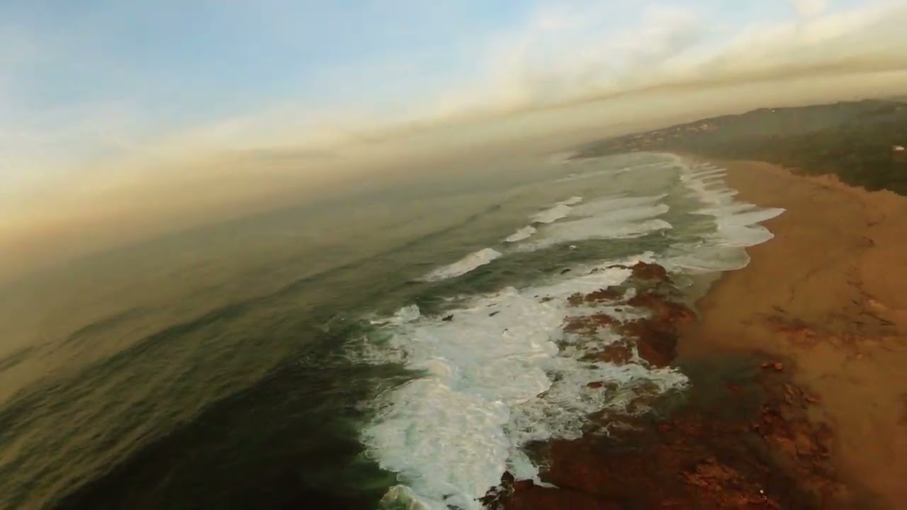 Flipping,  turning, and rolling over the ocean and beach ⛱️ at Umzumbe.