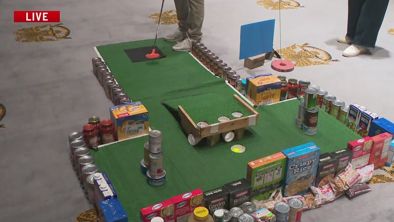 Mini Golf Open donates food to DMARC Food Pantry Network