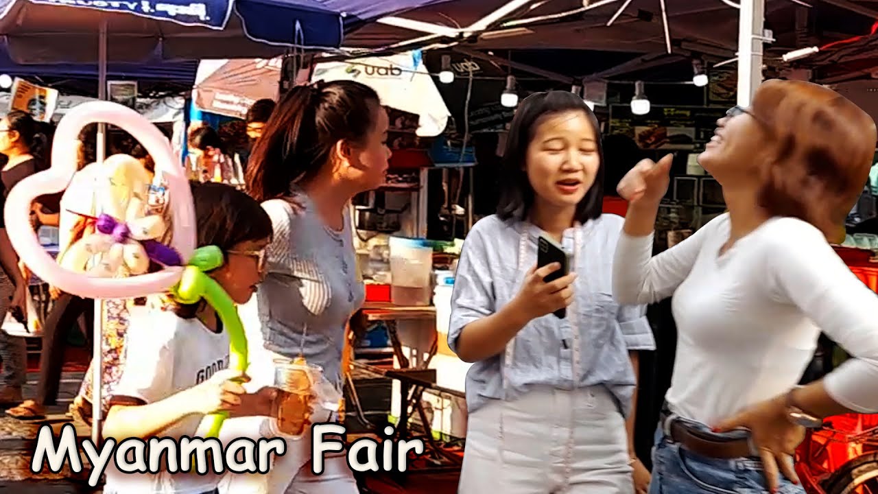 Exploring Myanmar's Colorful Street Fair   with a Local Girl