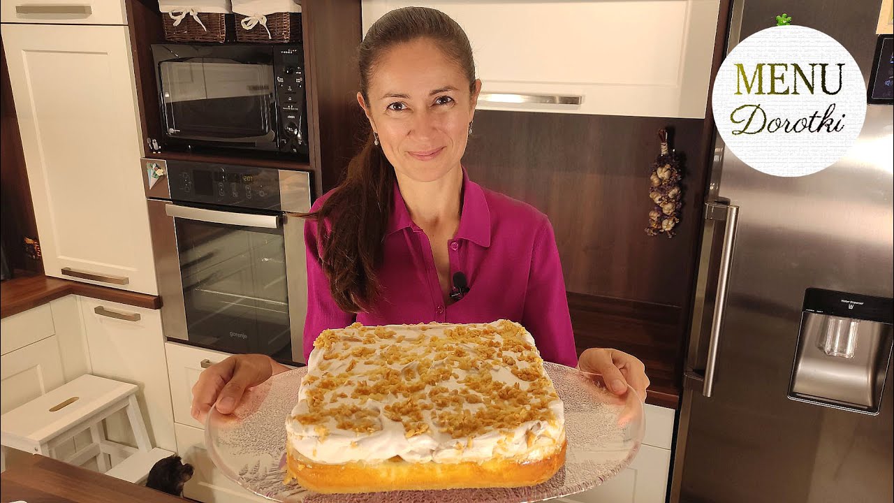 Sernik z brzoskwiniami na kruchym spodzie pod chmurką z pianki bezowej. Przepis MENU Dorotki.