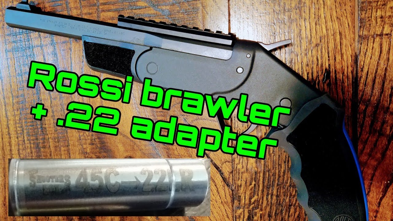 Rossi brawler with .22 caliber adapter from the shooter's box , shooting  pumpkins at KEYFARM.