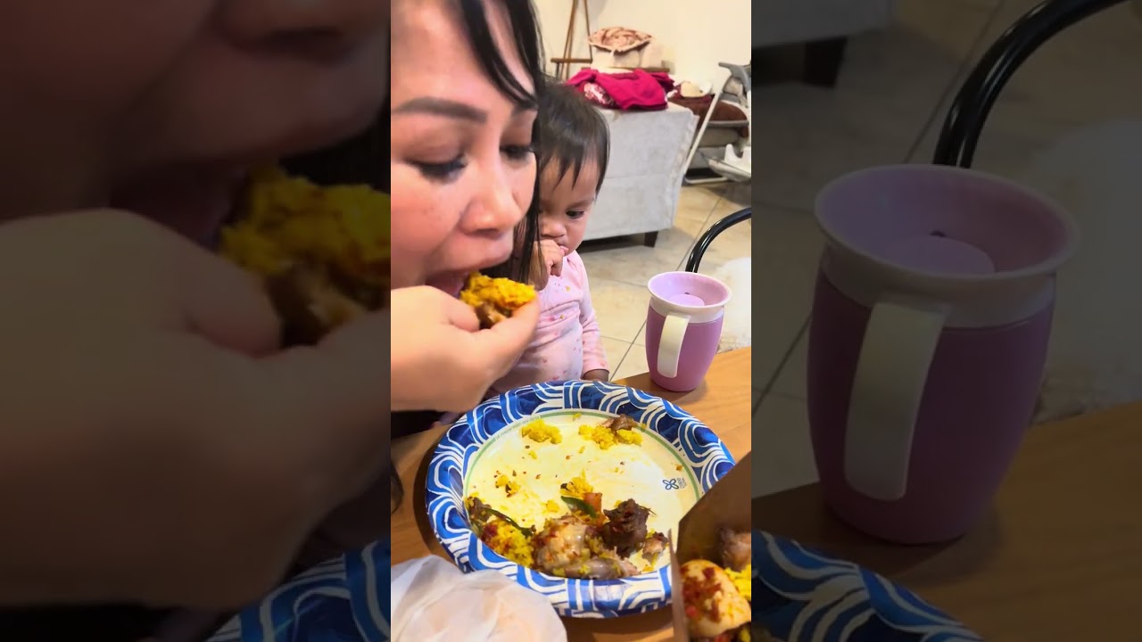 Naya makan Nasi kuning sambal