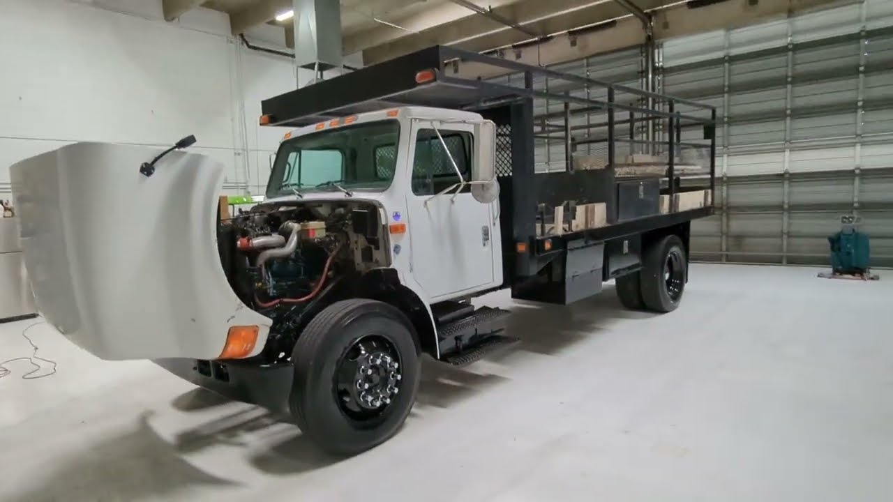 1998 INTERNATIONAL 4700 16' FLATBED 133k miles DT466 AND Allison Auto Trans