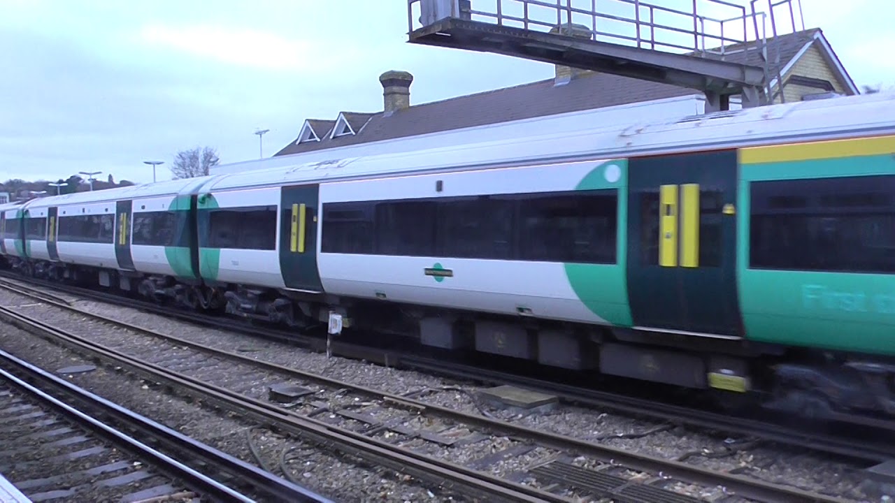 Ex-Thameslink 377 516 and Southern 377 163 depart Maidstone East