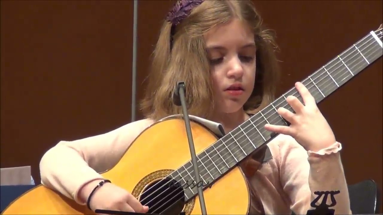 MangoBayBees21 |  Konstantina Andritsou An Amazing 7 Year Old Girl Guitarist  Performs Incredibly