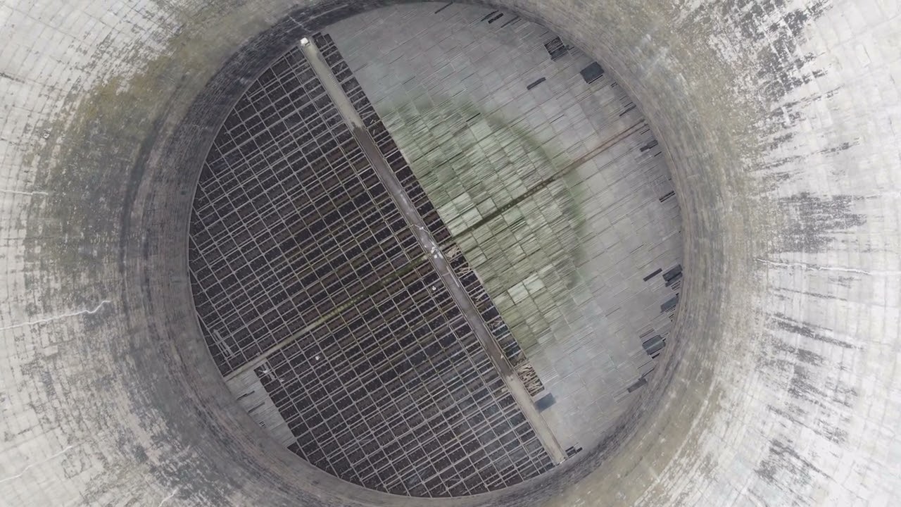 Fiddlers Ferry - Inside Cooling Tower, fill removal by workers.