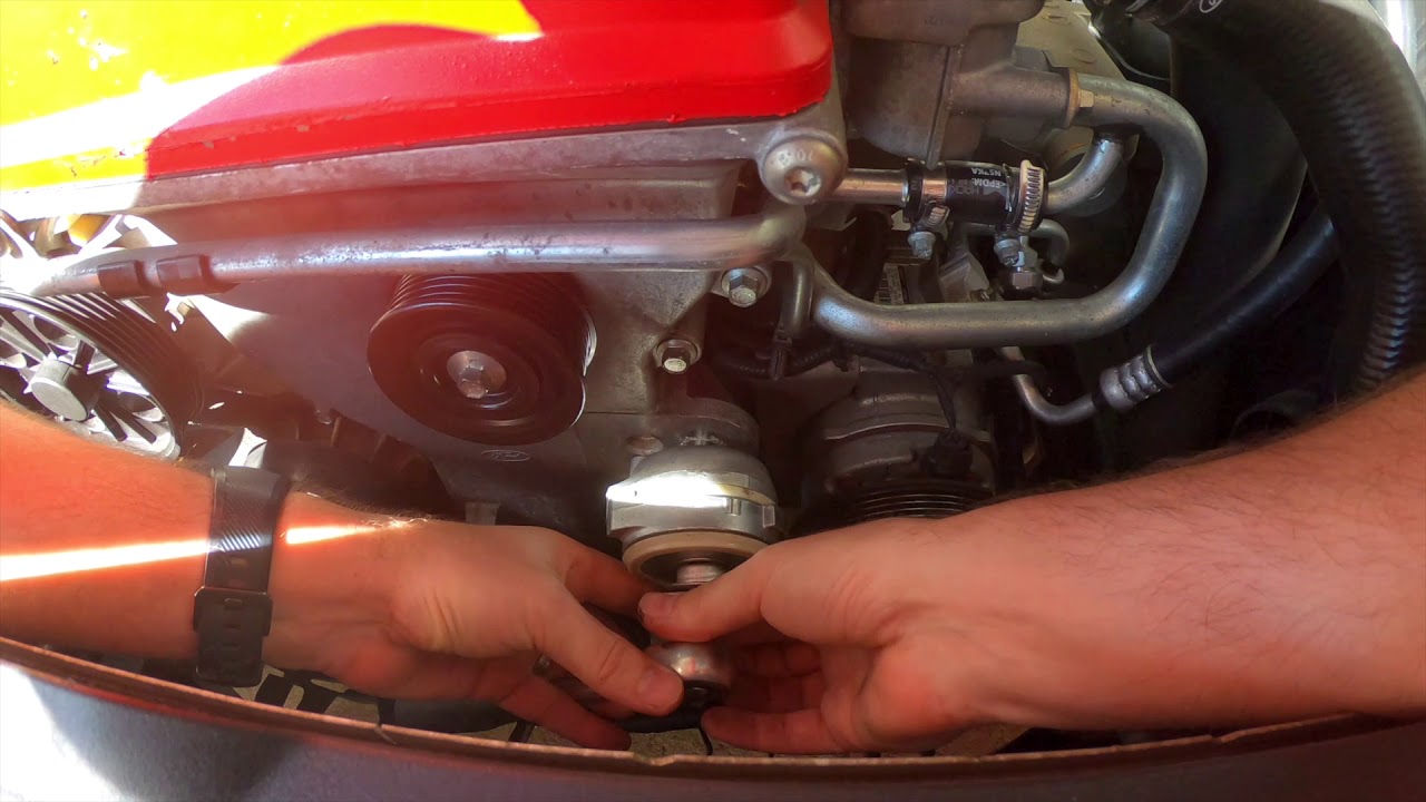 How to change a drivebelt and tensioner on a fg xr6 turbo