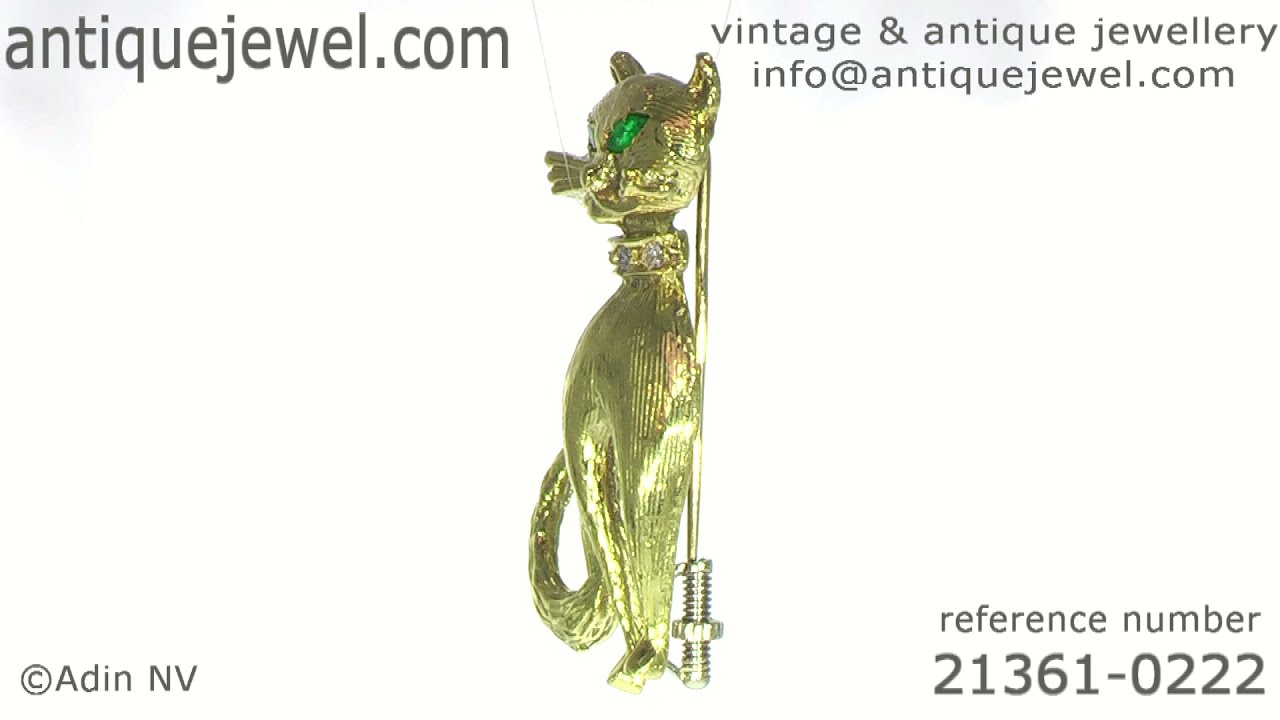 Vintage Sixties 18K gold cat brooch with diamond collar and emerald eyes. (Adin N&ordm; 21361-0222)
