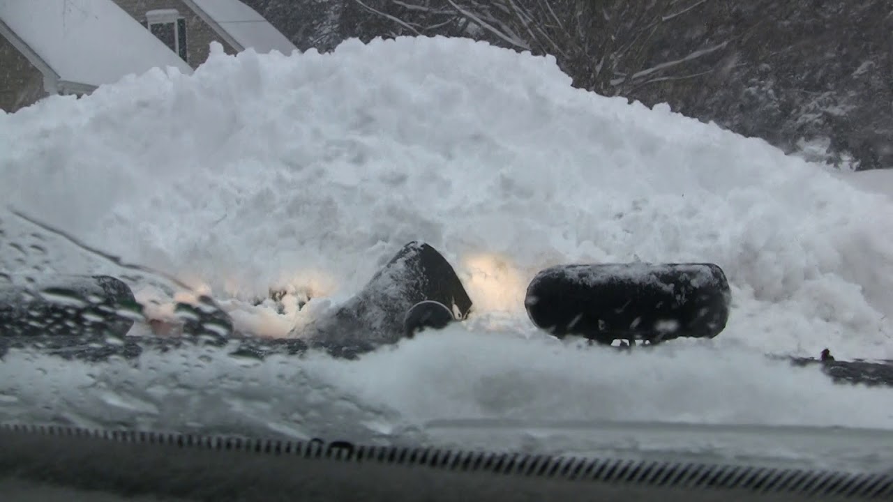 Cummins plowing knee deep snow