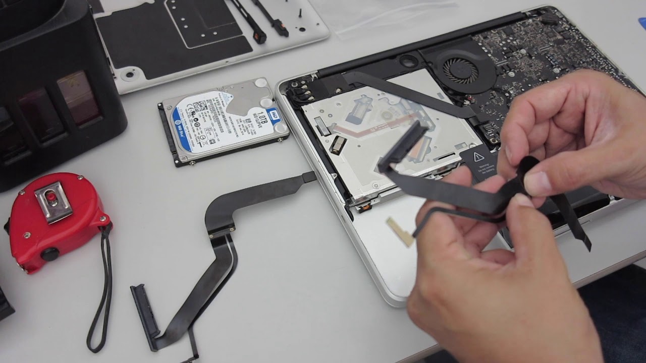👊 ▶Cómo cambiar el cable flex del disco duro en la MacBook Pro◀👍