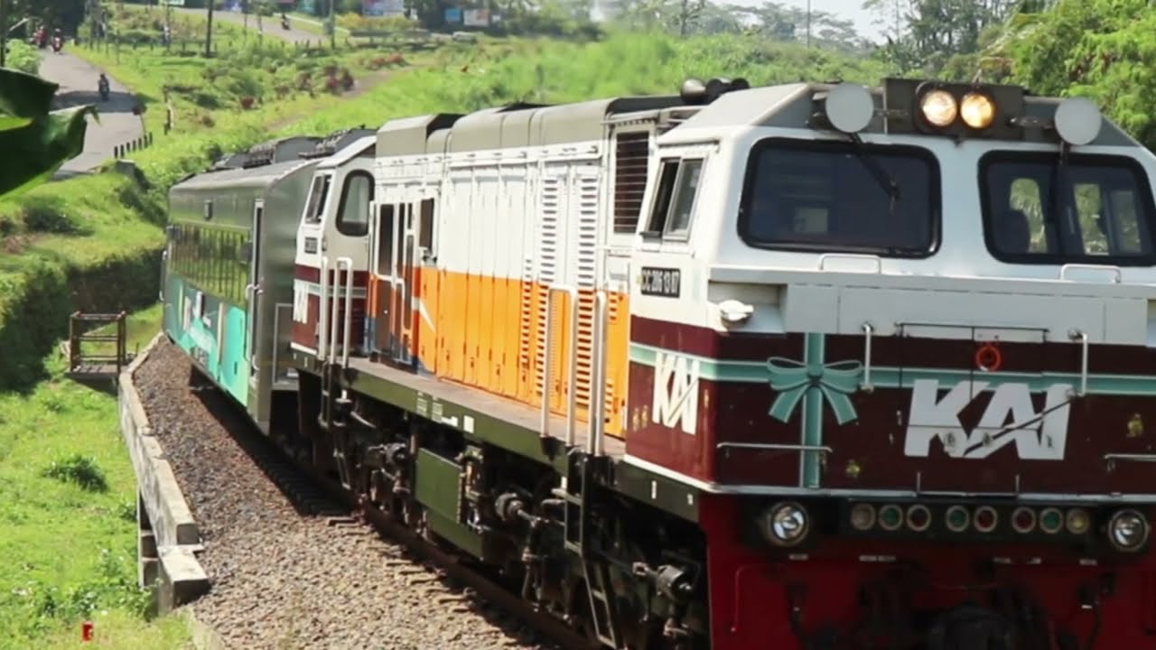 Rare Red Locomotive Leads Green Passenger Cars Cross the Railway Bridge | Java Railfanning