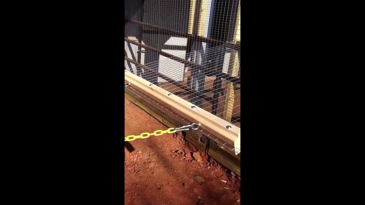 Stretching metal cloth for our chicken coop